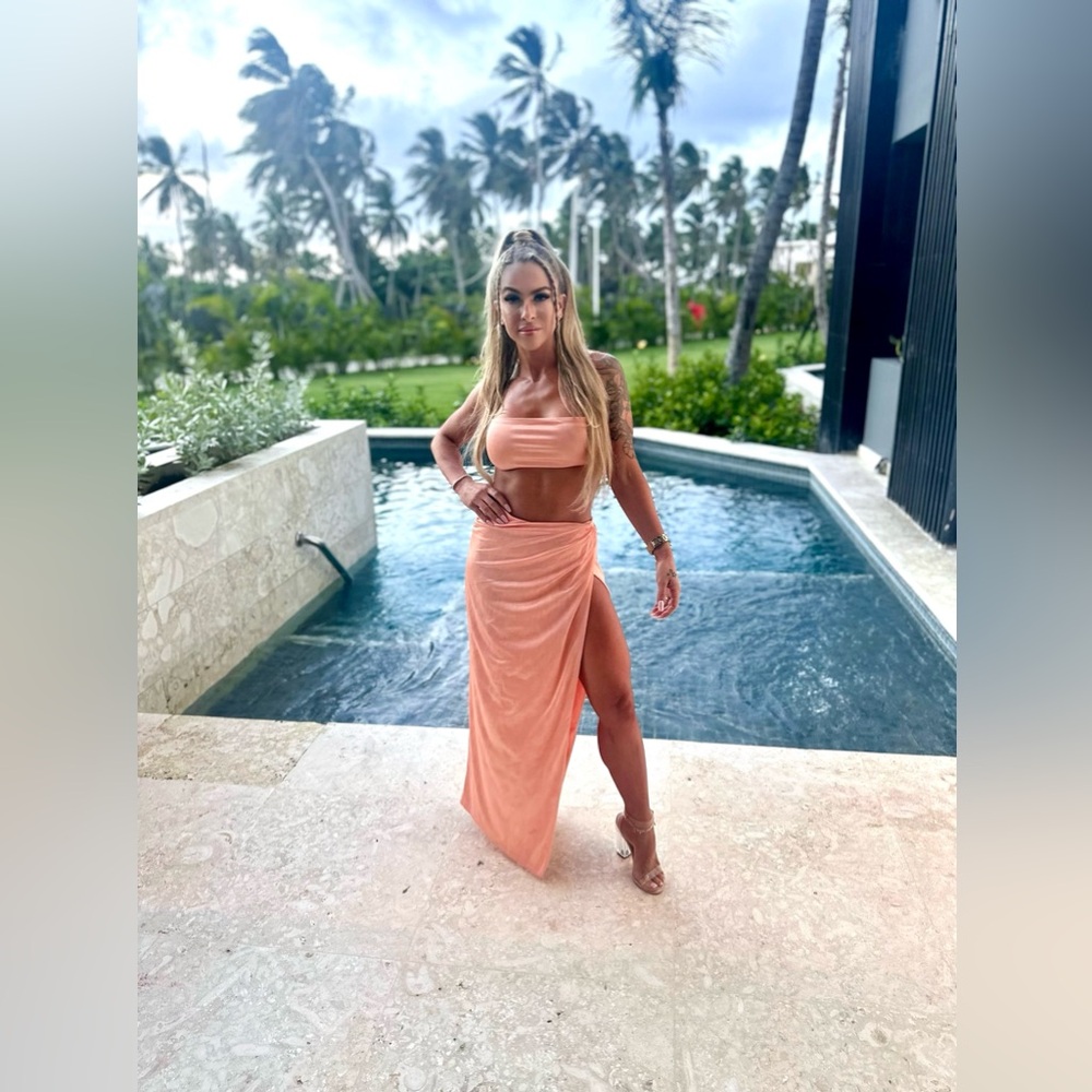 Gorgeous two piece Revolve skirt set in the color peach, size small.